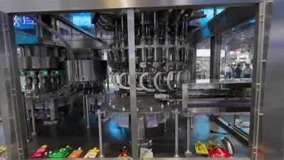 Máquina de llenado y tapado de bolsas con boquilla de 24 cabezales